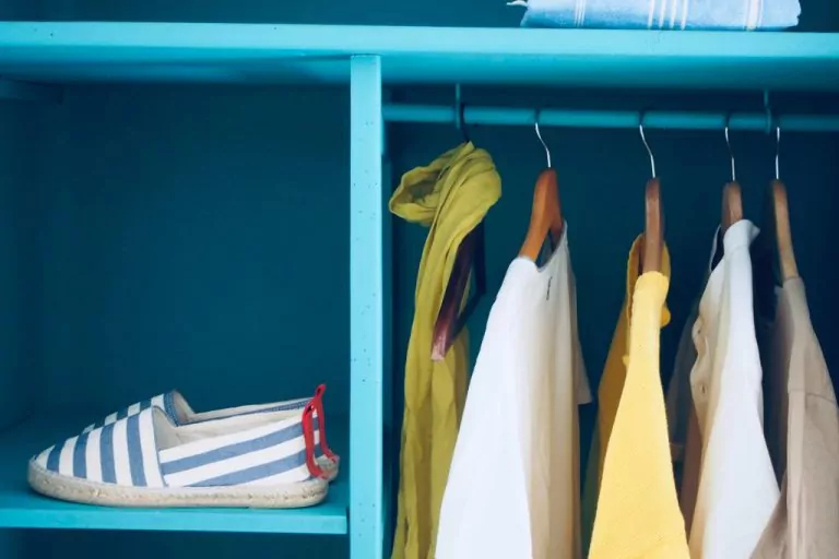 clothes in blue closet