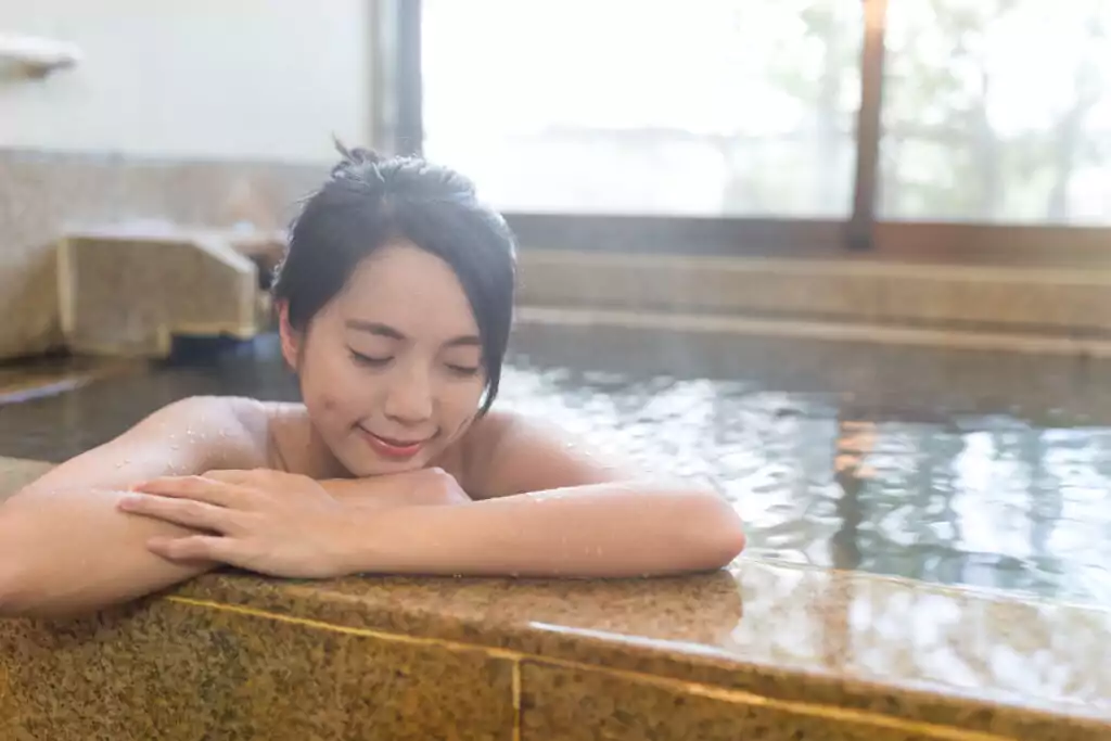 woman enjoy japanese hot spring 2022 12 15 22 39 39 utc